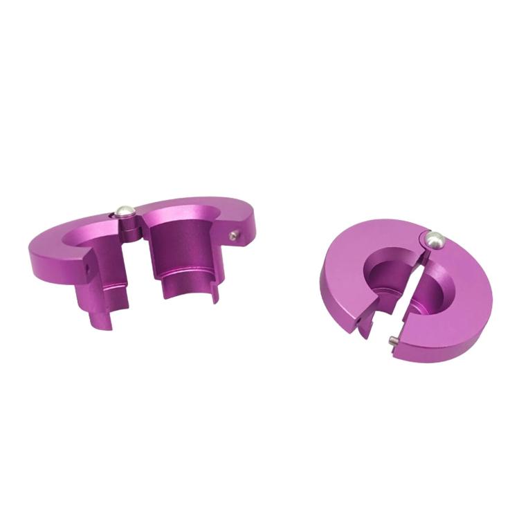 Purple line disconnect tool with two circular halves, metal bolt hardware, open clamp