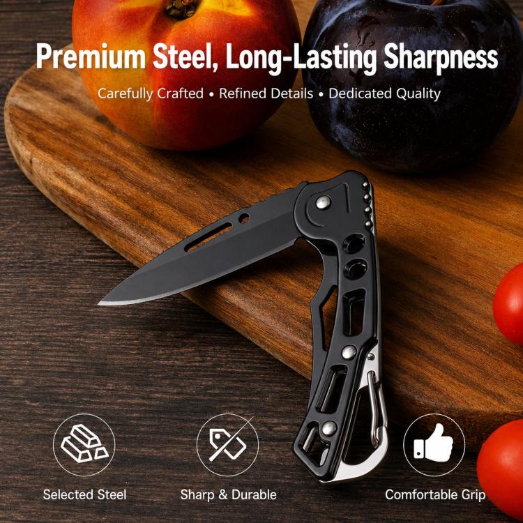 Black folding knife with sharp blade and comfortable grip, keychain ring