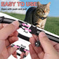 Adjustable cat GPS tracker collar with breakaway clasp and bell, shown in hands