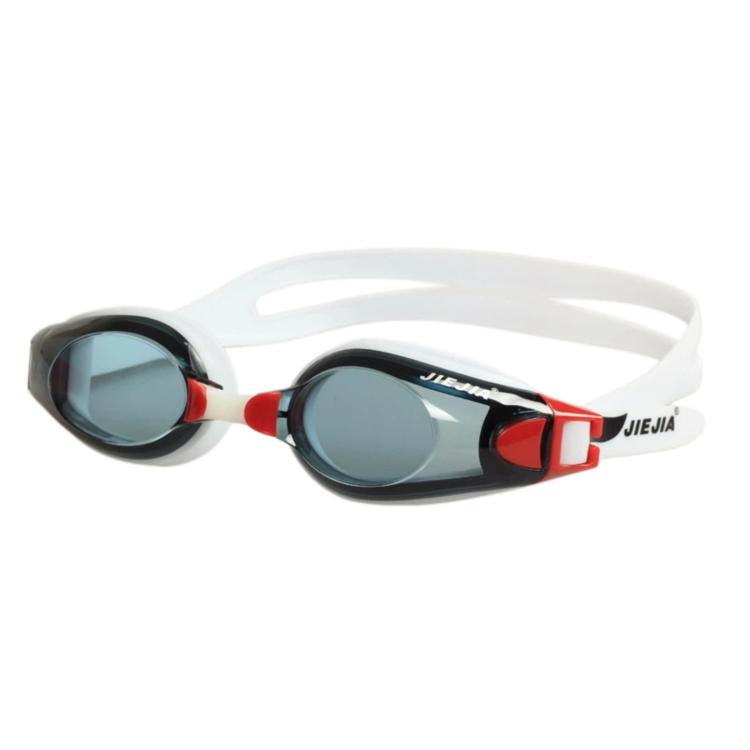 White swimming goggles with dark anti-fog lenses and red side accents
