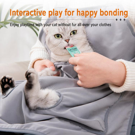 Gray cat grooming apron with cat in front pouch and open paw-holding holes