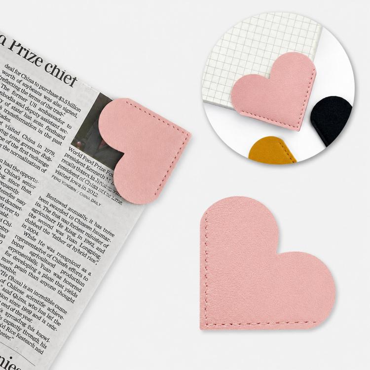 Pink heart-shaped bookmark corner clip with stitched edges, faux leather corner protector