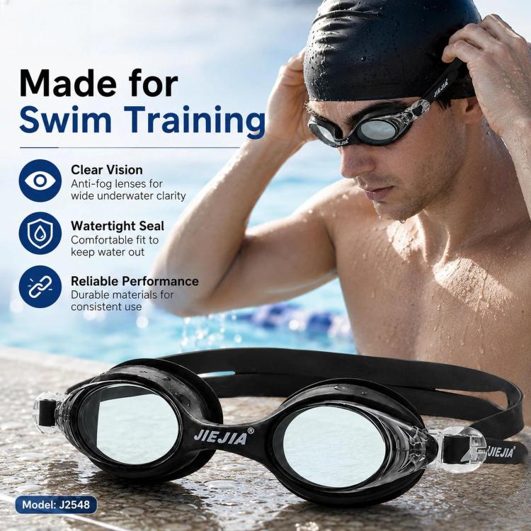 Black silicone swimming goggles on a swimmer, with anti-fog lenses and strap.