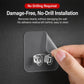 Transparent no-drill adhesive hook on wall, hand pressing backing pad with clear clips