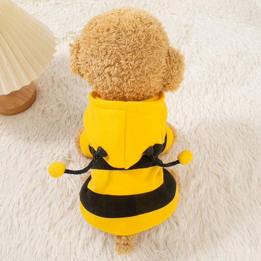 Yellow and black striped dog hoodie coat with pom-pom ear accents