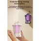 Portable mosquito-killing night light being held, white lantern with purple-glow light tubes