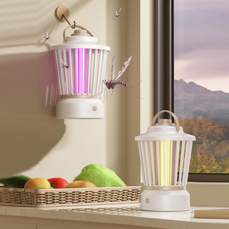 Plug-in mosquito night light in white with purple and yellow glowing lamp tubes