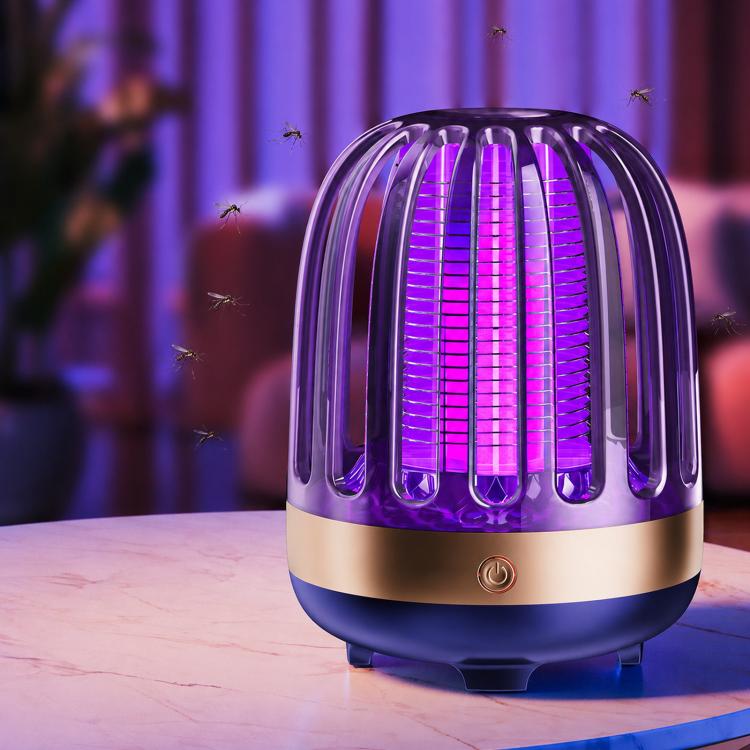Navy blue electric mosquito killer lamp with purple LED light chamber, countertop view