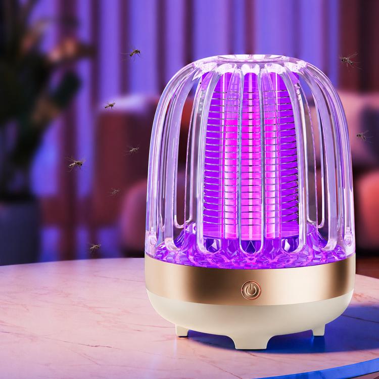 Navy blue electric mosquito killer lamp with purple UV glow, front view on table