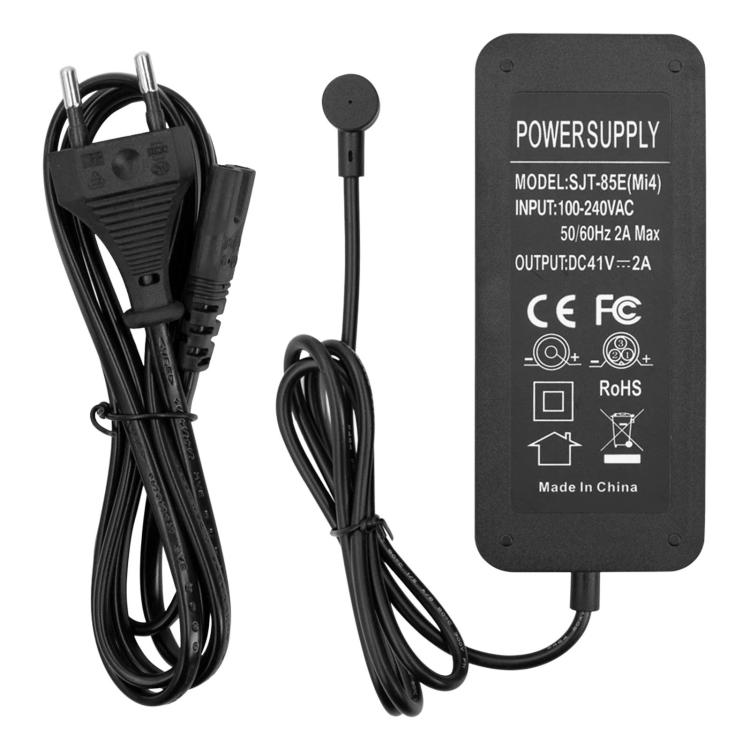 Electric scooter charger power adapter with black housing, label and connected cables