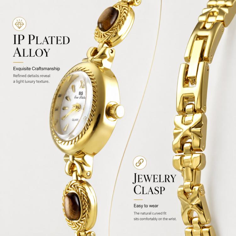 Gold oval analog quartz bracelet watch with clasp and stone accent links