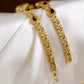 Gold metal chain bracelet with oval stone bezel watch links