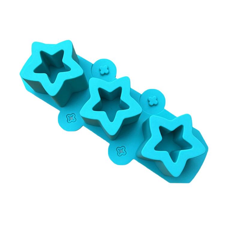 Light blue silicone squishy mold bar with three star cavities and flower accents