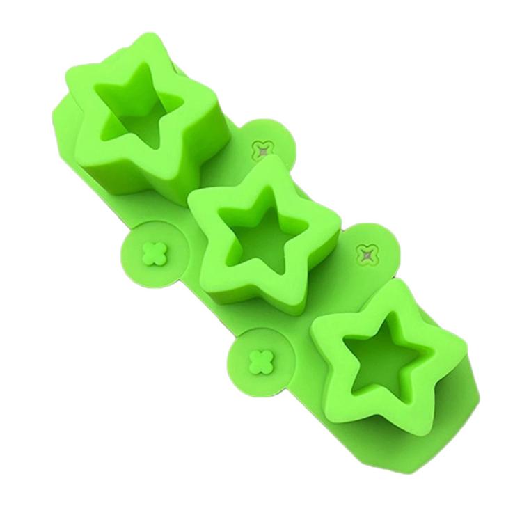 Green silicone squishy mold bar with three star cavities and flower accents