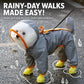 Gray dog raincoat with orange trim and clear hood visor