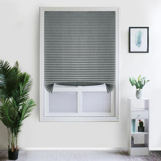 Gray pleated blackout window shade with roll-up fabric cover