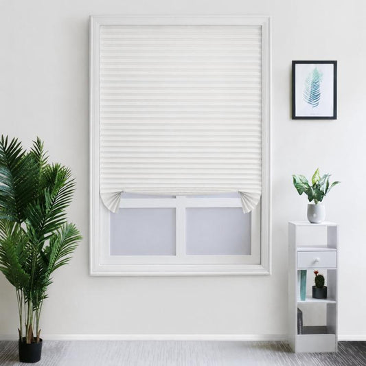 White pleated blackout window shade with roll-up fabric cover