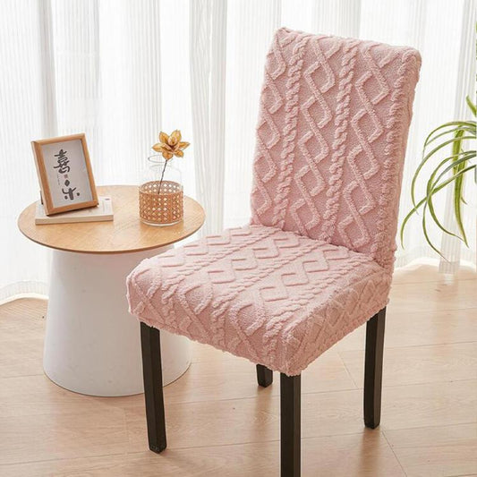 Pink stretch chair cover with braided geometric pattern on seat and tall back