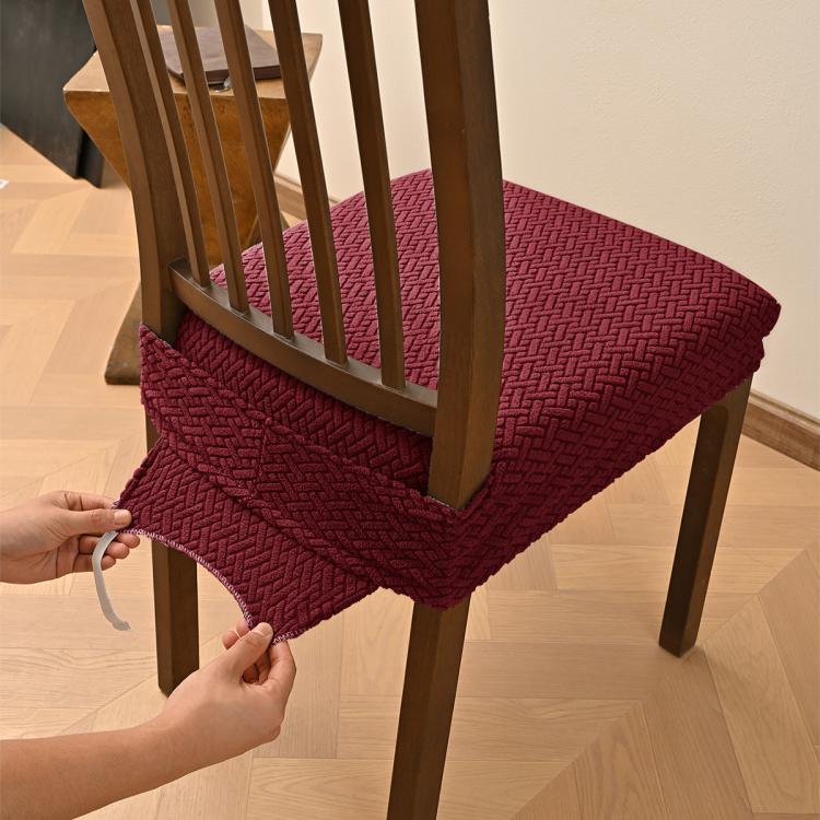 Wine red textured dining chair seat cover with elastic hem and buckle tabs