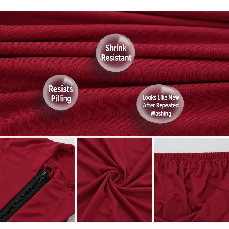 Red elastic chair cover fabric with visible knit texture and folded sections.