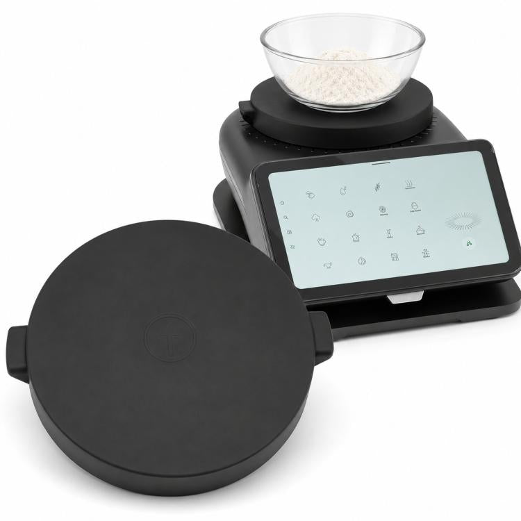 Round black silicone weighing plate cover for Thermomix scale base, with molded tabs