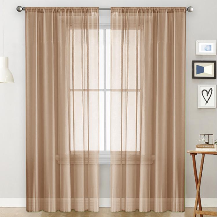 Light brown sheer voile curtain panel with rod pocket top for light filtering