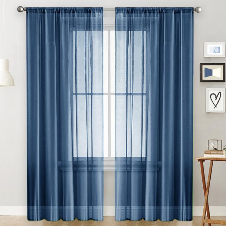 Single sheer light-filtering window curtain in dark blue with rod pocket header and grid panels
