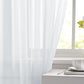 White sheer rod-pocket voile curtain panel with light-filtering drape