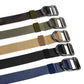 Assorted nylon web belts with D-ring buckles, black, blue, tan, and camo strap colors.