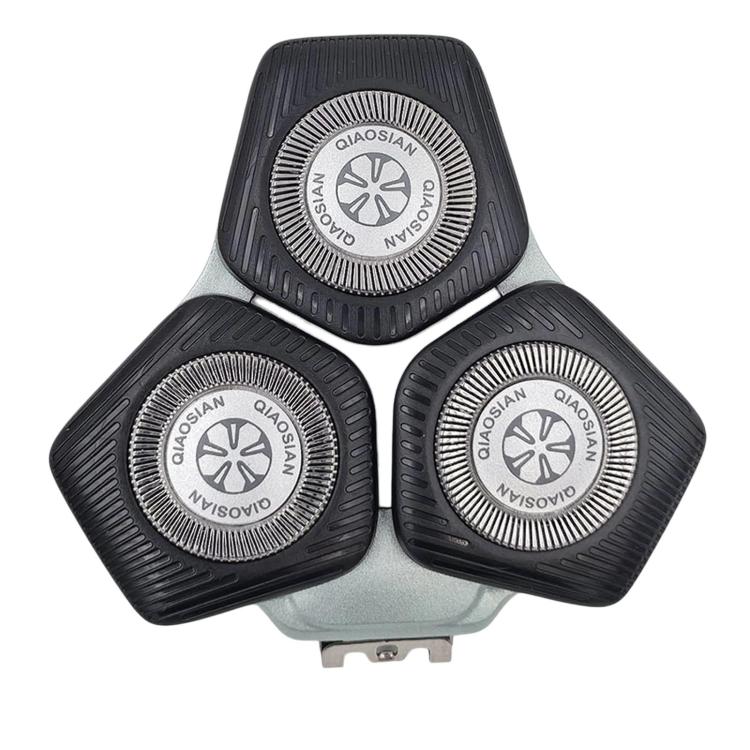 Dark black shaver replacement head with three circular foil trimmer blades.