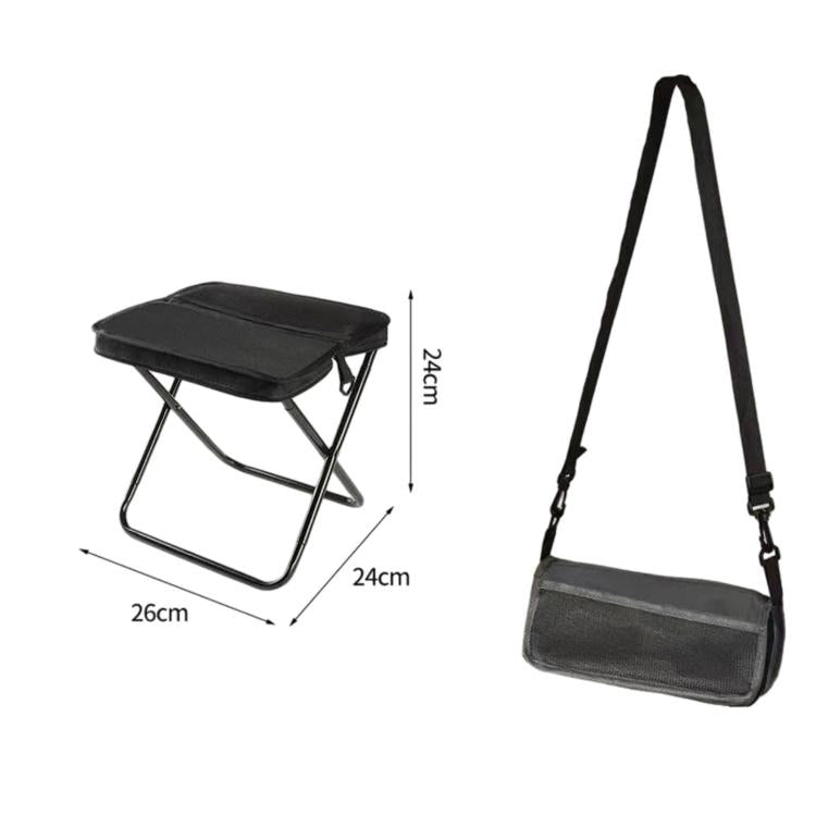 Black foldable crossbody bag-stool with padded seat and metal folding frame.