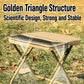 Khaki foldable crossbody bag-stool with padded seat on outdoor grass.