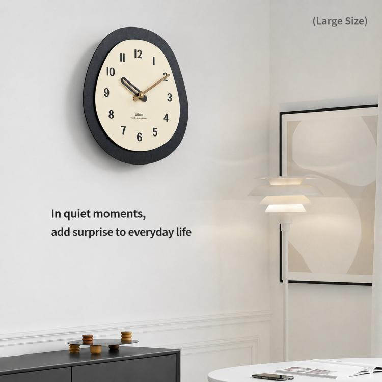 Large oval wall clock with dark frame, cream dial, and walnut wood clock hands