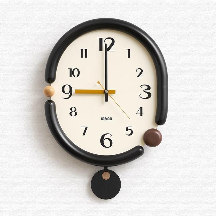 Retro oval wall clock, black frame with gold and black hands and round dangling tag