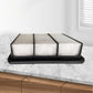 Car air filter with three white pleated panels in a black tray frame