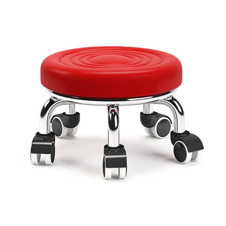 Low rolling stool with wheels, red round cushioned seat with ripple texture