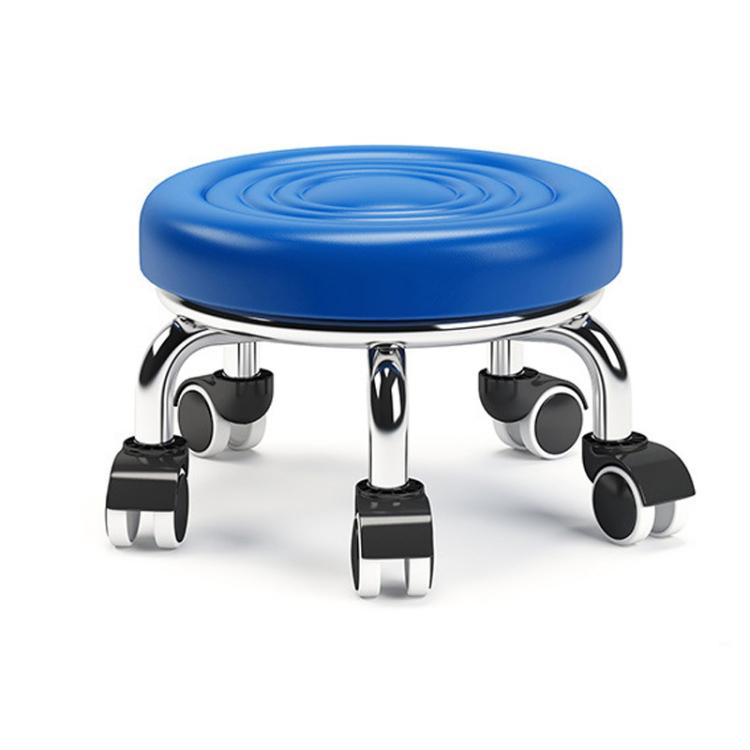 Low rolling stool with wheels, blue round cushioned seat with ripple texture