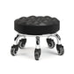 Low rolling stool with wheels, black cushioned seat with quilted ridges