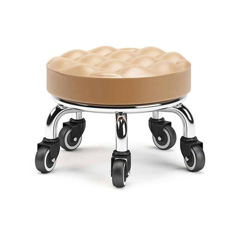 Low rolling stool with wheels, beige cushioned seat with quilted ridges