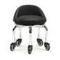 Low rolling stool with wheels, black padded seat on chrome base with caster wheels