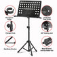 Black portable folding music stand with perforated panel, page holder, tripod legs