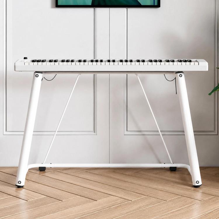 White U-shaped metal electronic piano stand with four splayed legs