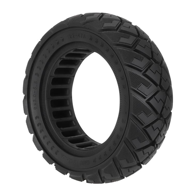 Black solid electric scooter replacement tire with diamond tread pattern.