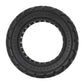 Black solid electric scooter replacement tire with diamond tread, side view.