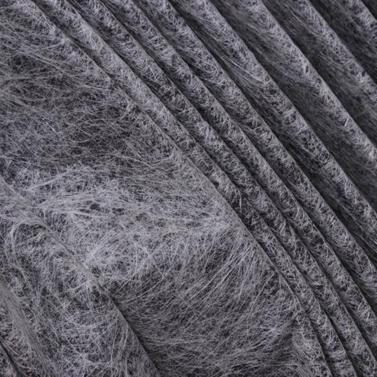 Cabin air filter close-up of gray fibrous pleated media