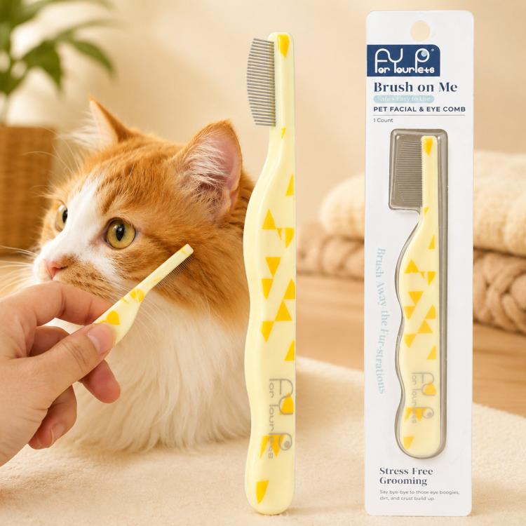 Beige pet facial and eye comb with fine metal teeth and curved safety pins