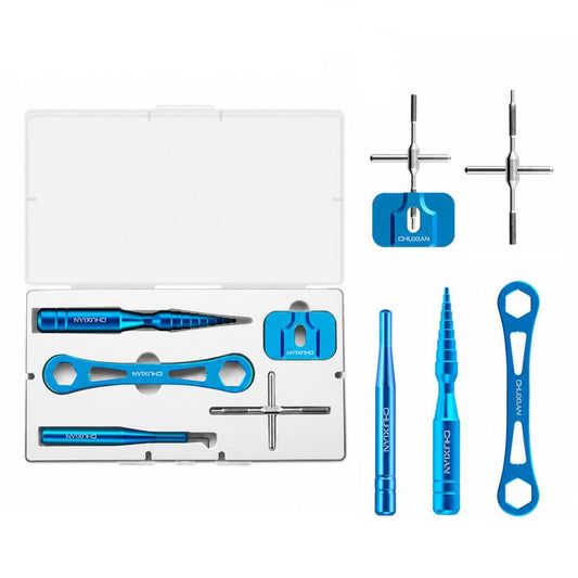 Blue aluminum fishing reel tool kit with tools and open white storage case
