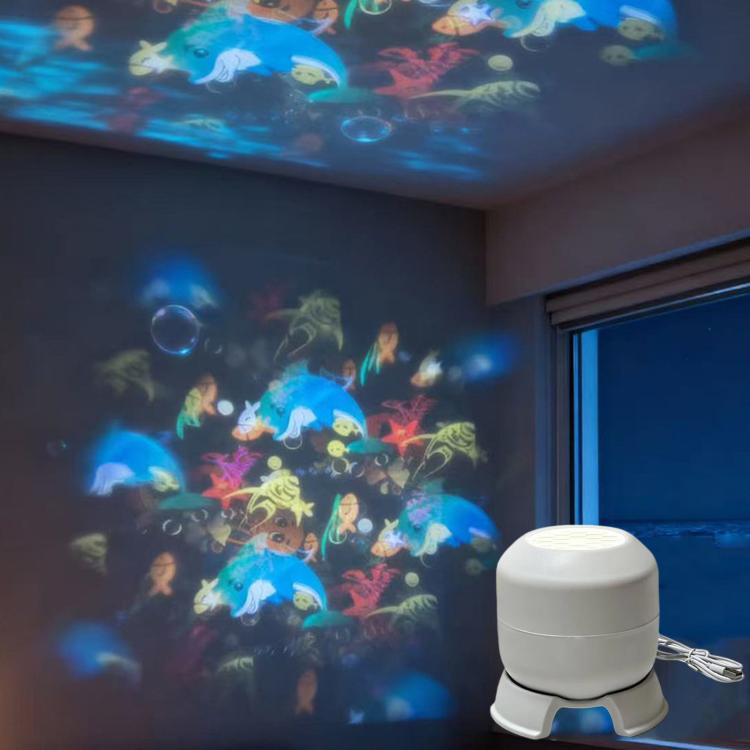 White LED projector light with three-foot base and power button, metal keyring attached