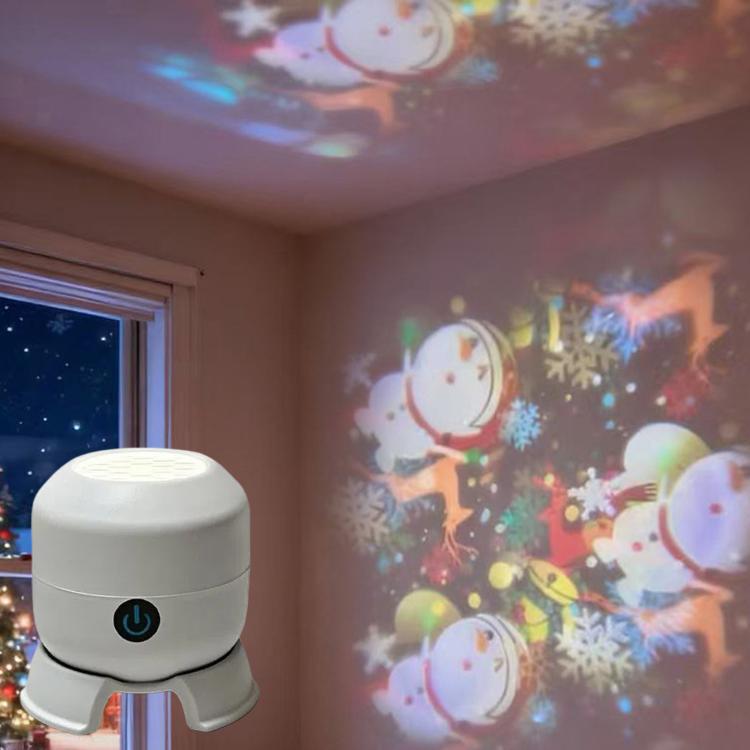 White LED projector light with three-foot base, power button and metal keyring attached