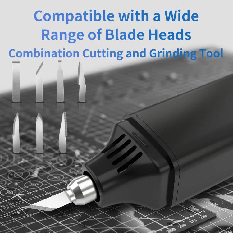 Ultrasonic cutting pen with exposed blade tip on a grid cutting mat